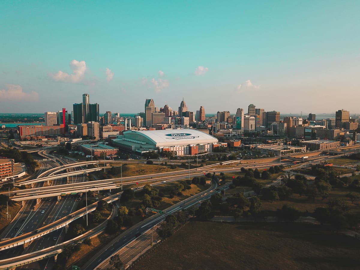 Featured image for the Big Greektown changes // Oakland County roundabouts // Driver licenses lagging podcast.